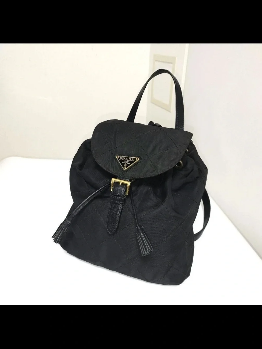 Prada Black Quilted Nylon Drawstring Backpack with Gold Hardware
